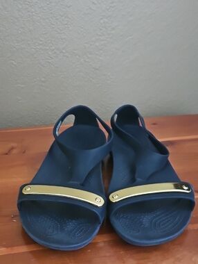 CROCS Navy Slingback Sandals with Gold Bar Detail